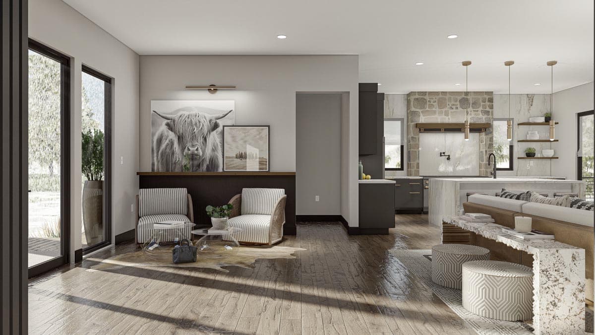 Open concept living area with large windows, a stone accent wall kitchen with island, and a modern seating area.