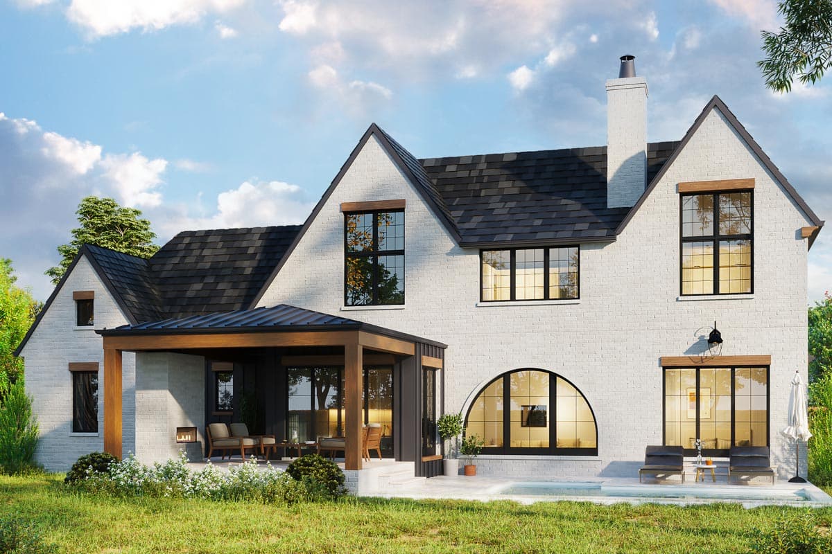 House plan exterior: Modern farmhouse style, two stories, white brick, gabled roof, covered patio with outdoor fireplace.