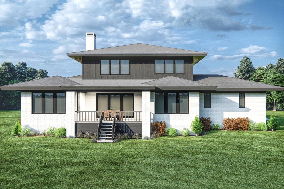 Modern house plan exterior with white brick, dark wood siding, flat rooflines, and a rear deck with stairs.
