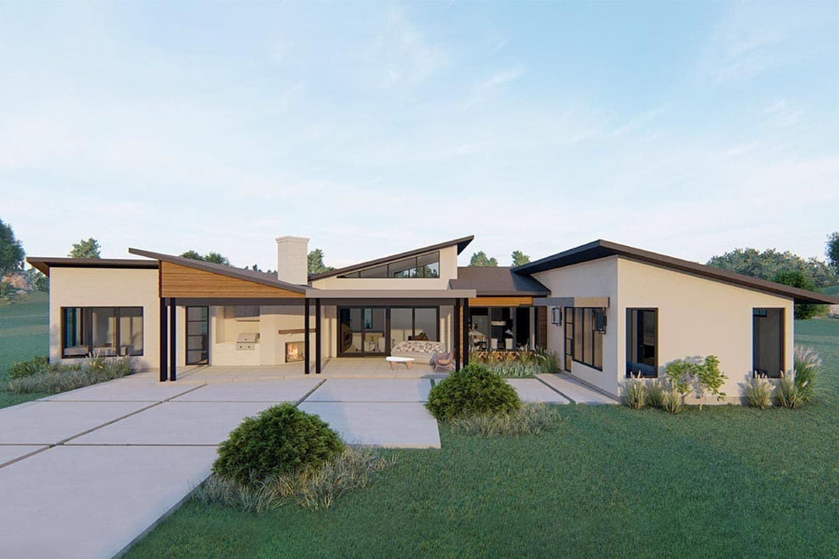 Modern house plan exterior with a single story, asymmetric rooflines, covered patio with outdoor fireplace, and large windows.