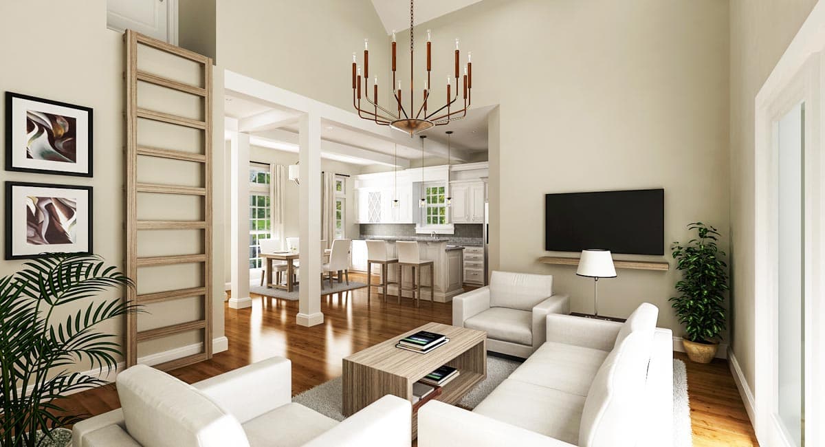 Open concept living space with vaulted ceiling, kitchen island, dining area, and decorative ladder.