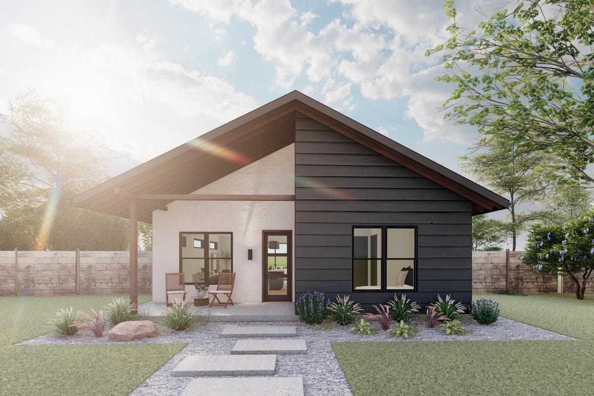 House plan exterior. One-story Modern design with a covered porch, gabled roof, and dark siding contrasted with light stucco.