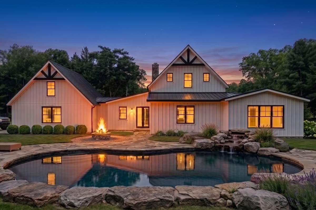 House plan exterior: Modern Farmhouse style, two stories, prominent gables with decorative rafter tails, and a central chimney.