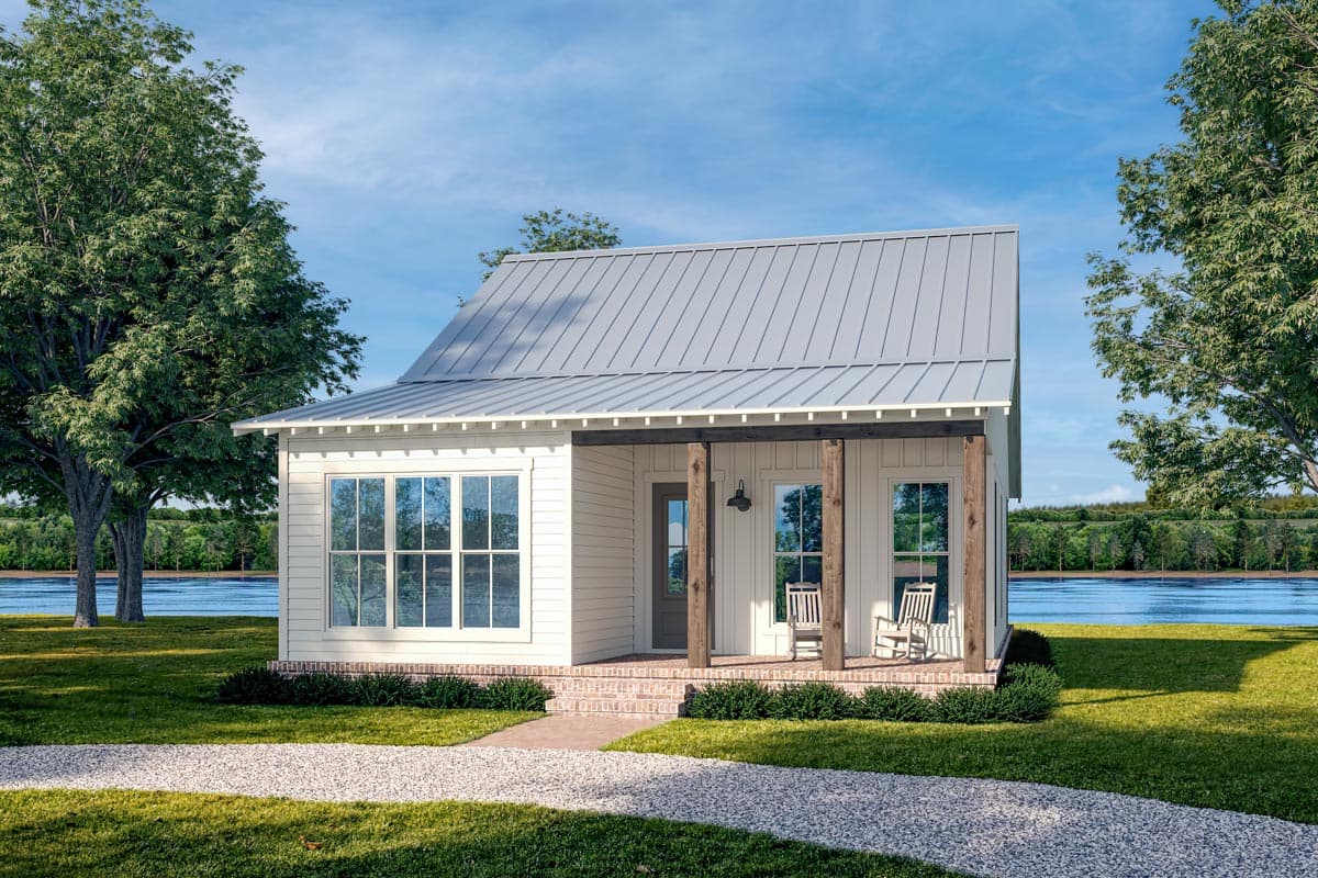House plan exterior: Modern Farmhouse style, one story, with a metal gable roof, covered front porch with wooden posts, and large grid-pane windows.