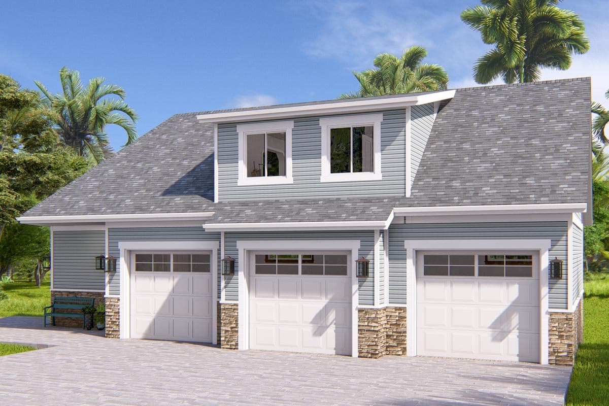 Three-car garage with stone accents and dormer windows. House plan exterior.