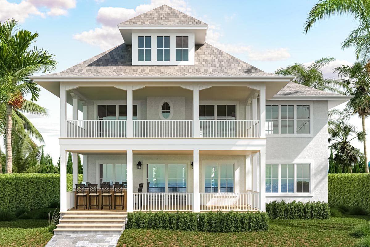 House plan exterior: two-story home with covered porches, central dormer with triple windows, and an oval attic window.