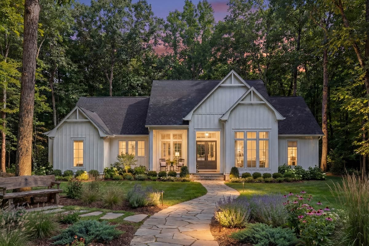 Modern Farmhouse exterior plan with board and batten siding, large gables, prominent entry porch, and ample windows.