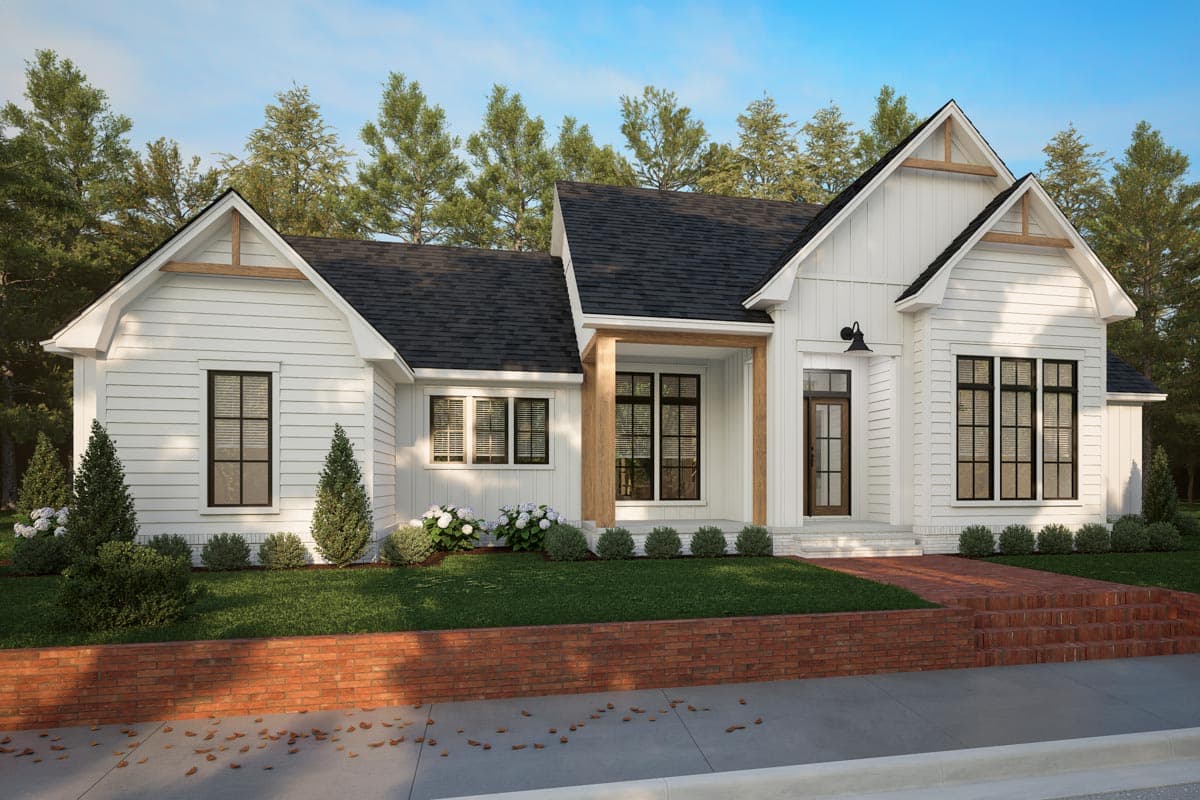 Modern Farmhouse house plan exterior with white board and batten siding, gables, exposed wood beams, and a covered entry.