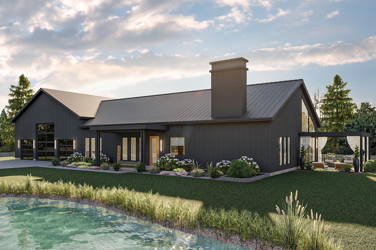 Modern farmhouse house plan exterior. Features include a metal roof, front porch, a gabled roof over the garage, and a chimney.