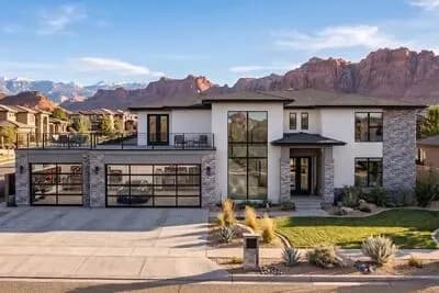 Modern Prairie Style House Plan with Two Levels of Outdoor Living