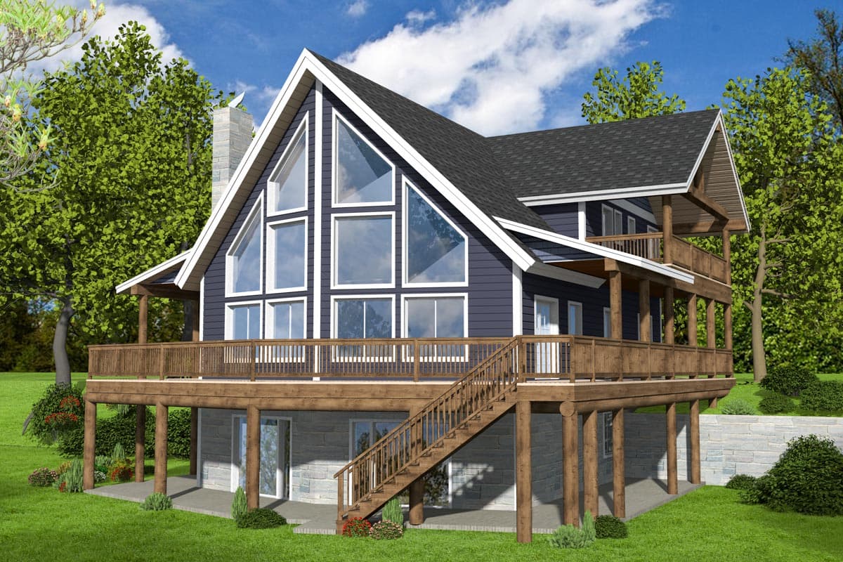 House plan exterior. Two-story home with A-frame roof and large windows. Features include a wrap-around deck, stairs, and a partial stone foundation.