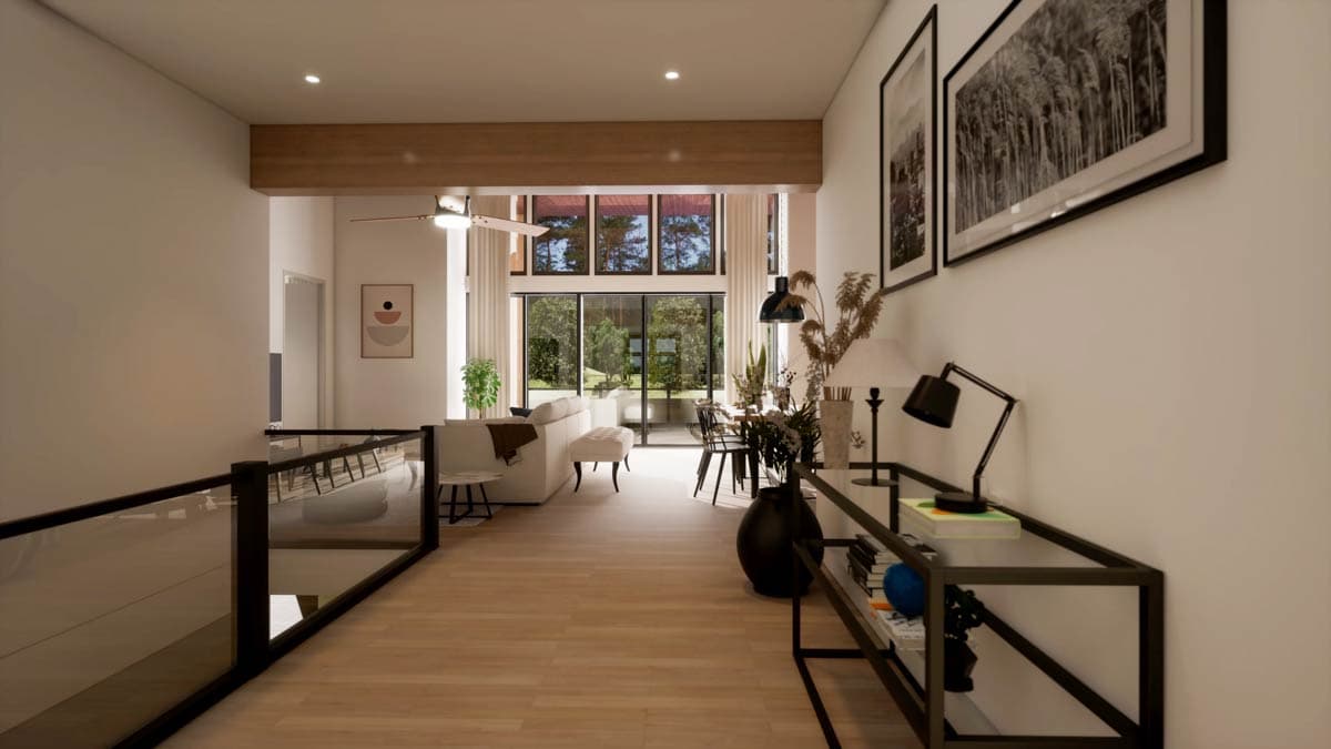 Modern interior with a view. Light wood floors, white walls, and a large window overlooking trees define the living space, creating an open design.