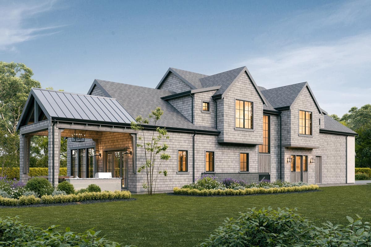 House plan exterior of a two-story home with shingle siding, gabled dormers, and a covered outdoor living space with a metal roof.
