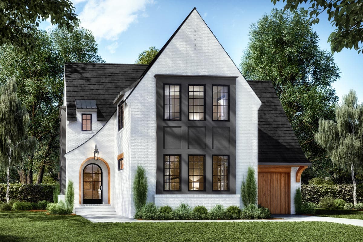 House plan exterior. Two-story Tudor style home with gabled roof, arched entry, and integrated garage. Features dormer window.