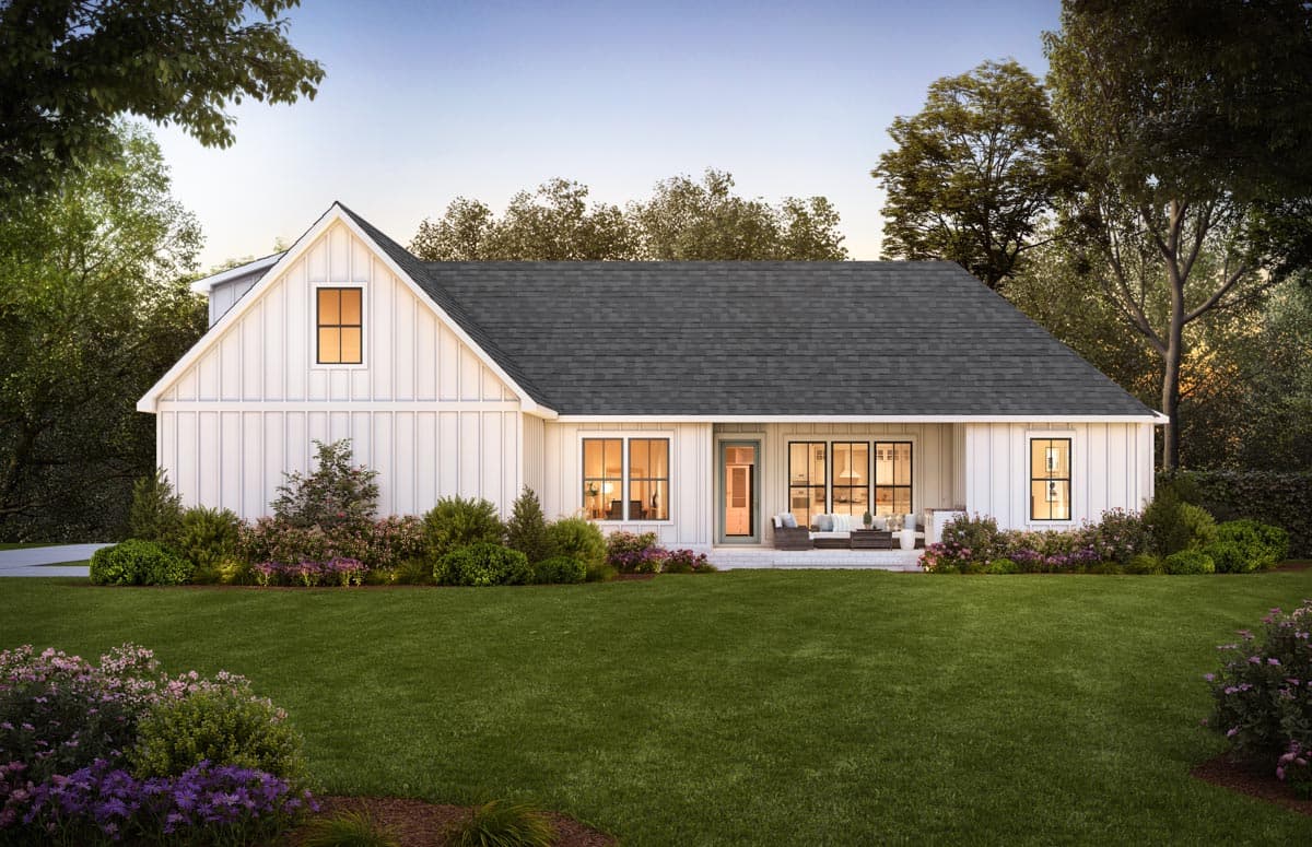Modern Farmhouse style house plan exterior with board and batten siding, large gabled dormer, and covered patio.
