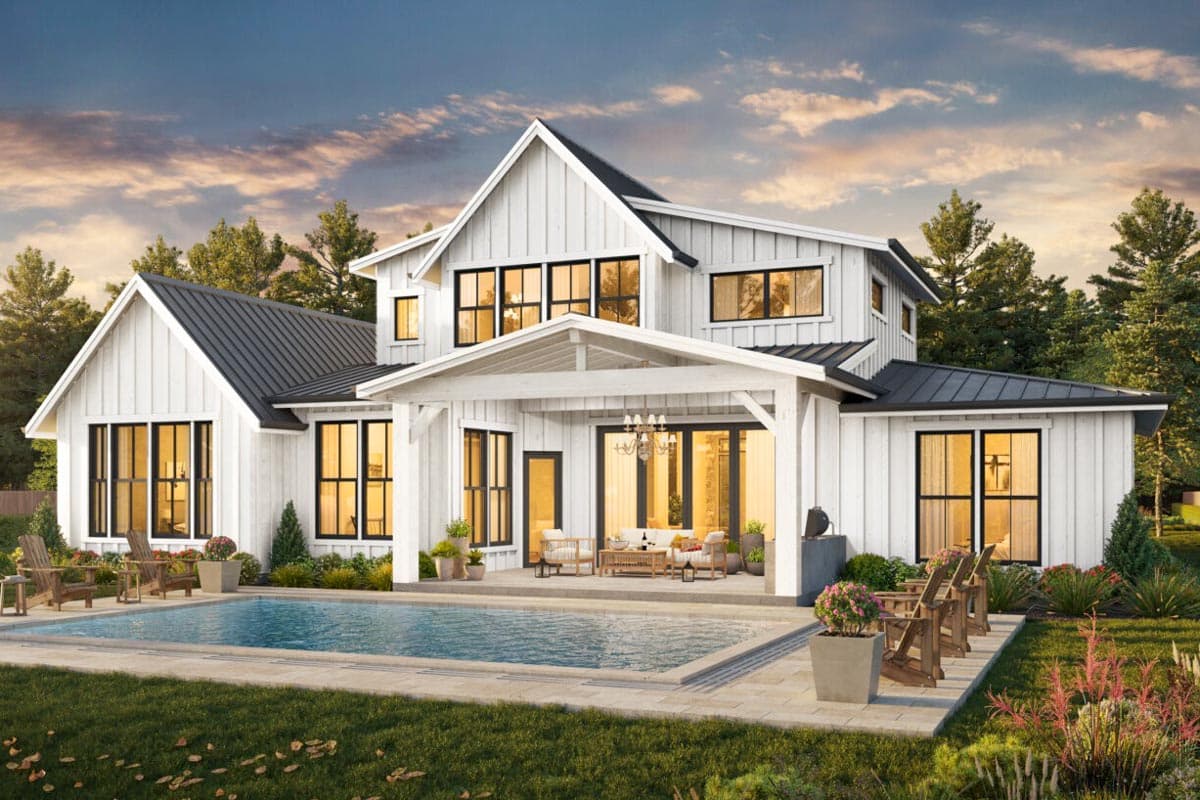 Modern Farmhouse house plan exterior with gables, metal roof, covered patio, and swimming pool.
