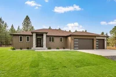 Contemporary One-Level House Plan with Home Office and a 3-Car Garage