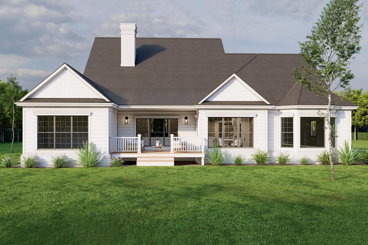 House plan exterior: Modern Farmhouse style, one story, white siding, gables, dormer, chimney, porch, and bay window.