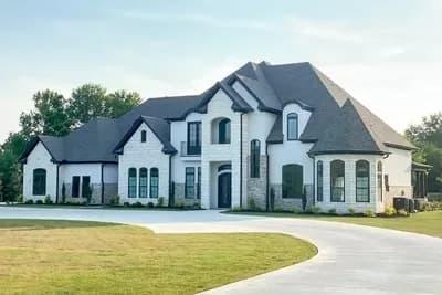 Luxury European Home Plan with Two Master Suites and Laundry Rooms