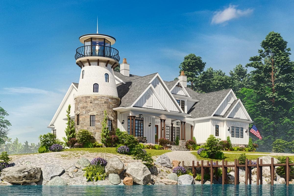House plan exterior featuring a lighthouse tower with stone base, white siding, gables, and a covered porch.