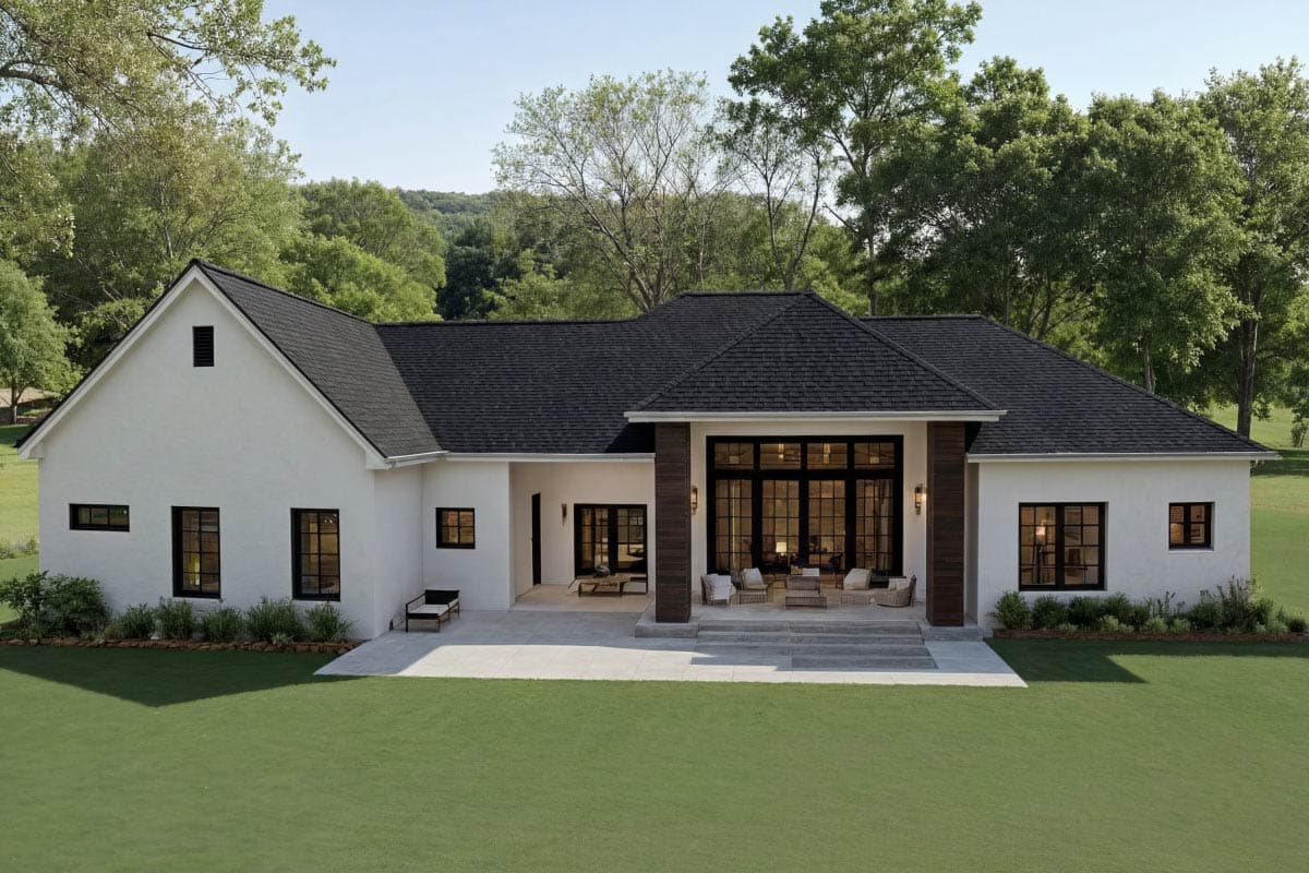 House plan exterior: Single-story modern farmhouse with gable roof, white stucco, large black-framed windows, and covered patio.