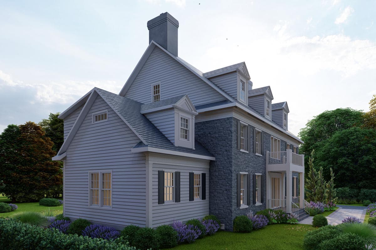 House plan exterior: Two-story home with gabled dormers, a prominent chimney, stone facade, and covered balcony.