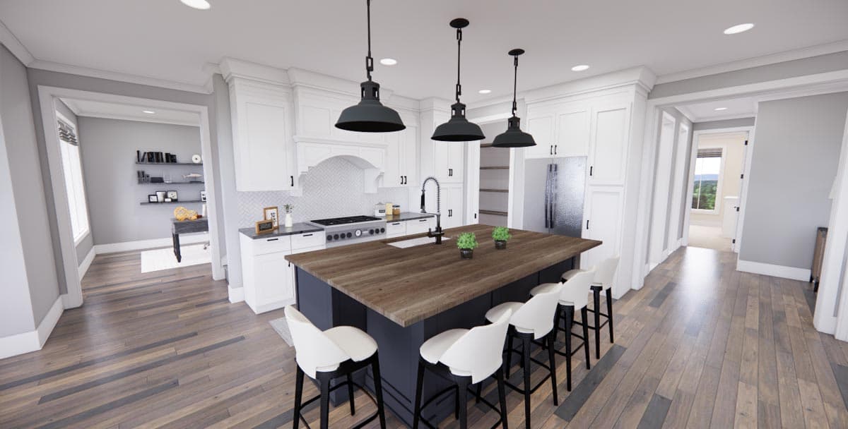 Kitchen interior featuring a large island with seating, pendant lights, range, and cabinets. Opens to a home office.