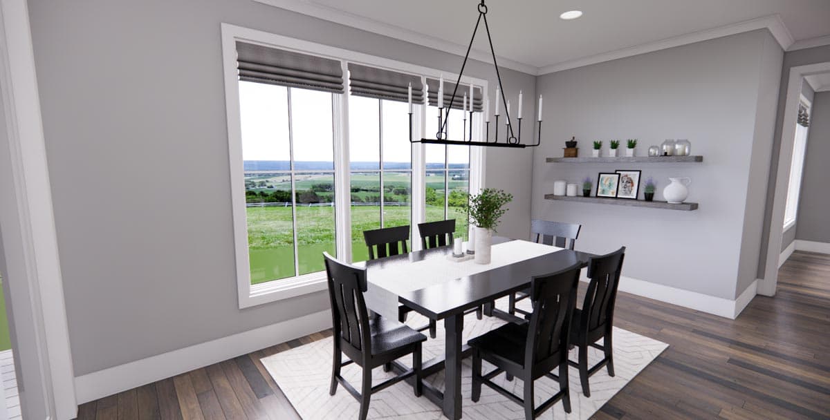 Dining room with dark wood table and chairs, large windows, and decorative shelves.