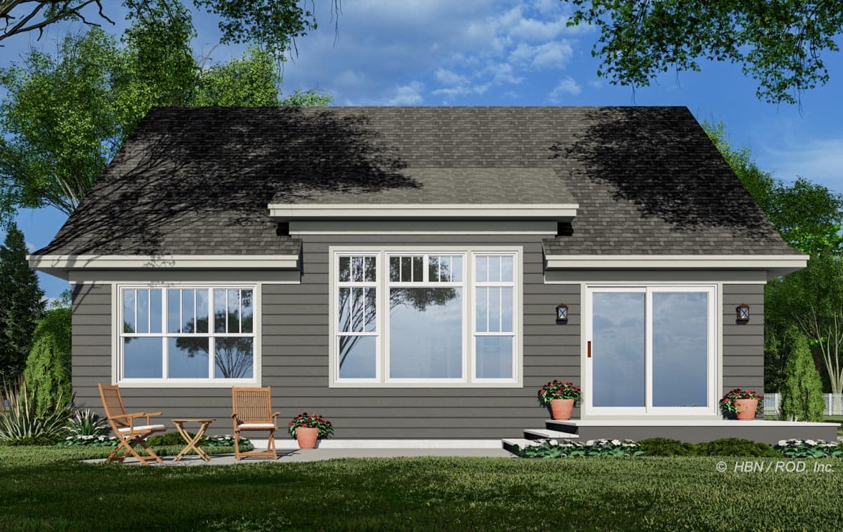 House plan exterior: One-story home with a gray horizontal siding, multiple windows, and a sliding glass door.