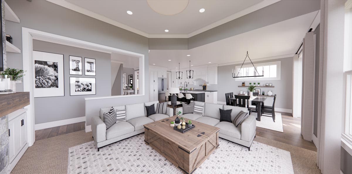 Interior rendering of an open-concept living area with a sectional sofa, coffee table, and adjacent kitchen with island and dining area.
