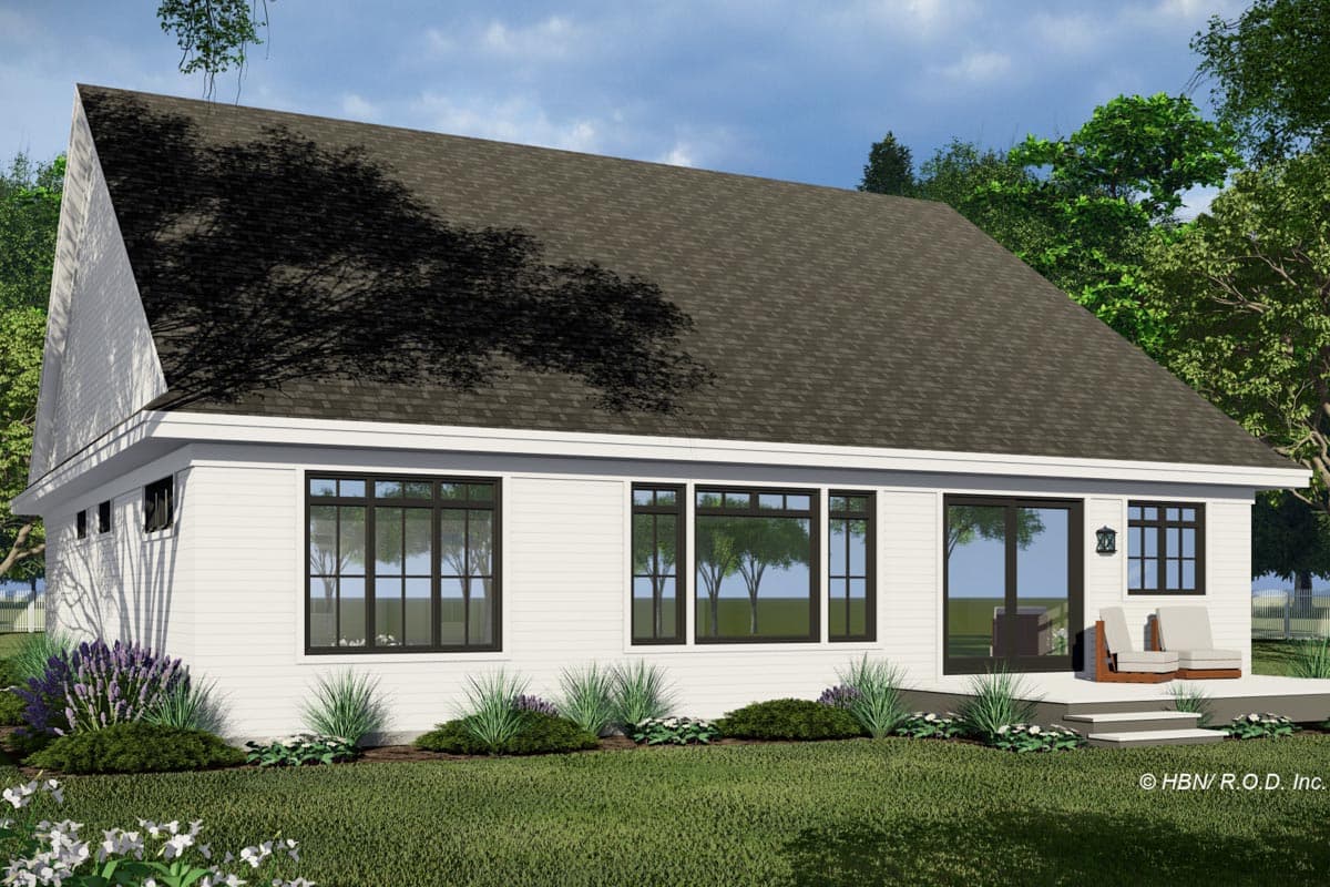 House plan exterior: One-story Modern Farmhouse with a prominent gable, expansive windows, and a rear deck.