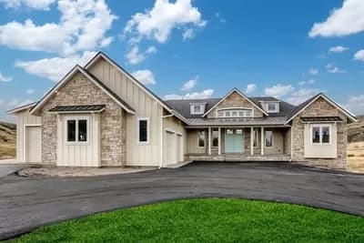 New American House Plan with RV Garage and Finished Lower Level