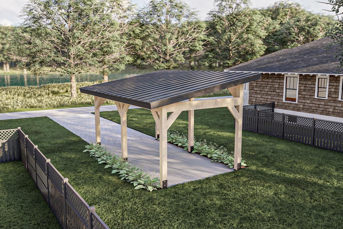 Timber frame carport with metal roof and sloped design, adjacent to a shingled house with lattice fence.