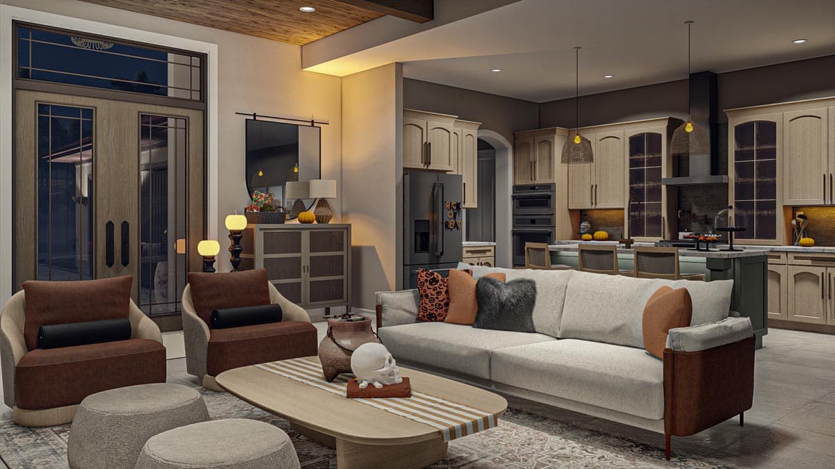 Open concept living area and kitchen with natural wood cabinets, a large sectional sofa, island with seating, and double entry doors.