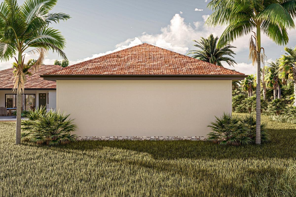 House plan exterior featuring a tile roof, stucco walls, and landscaping with palm trees and grass.