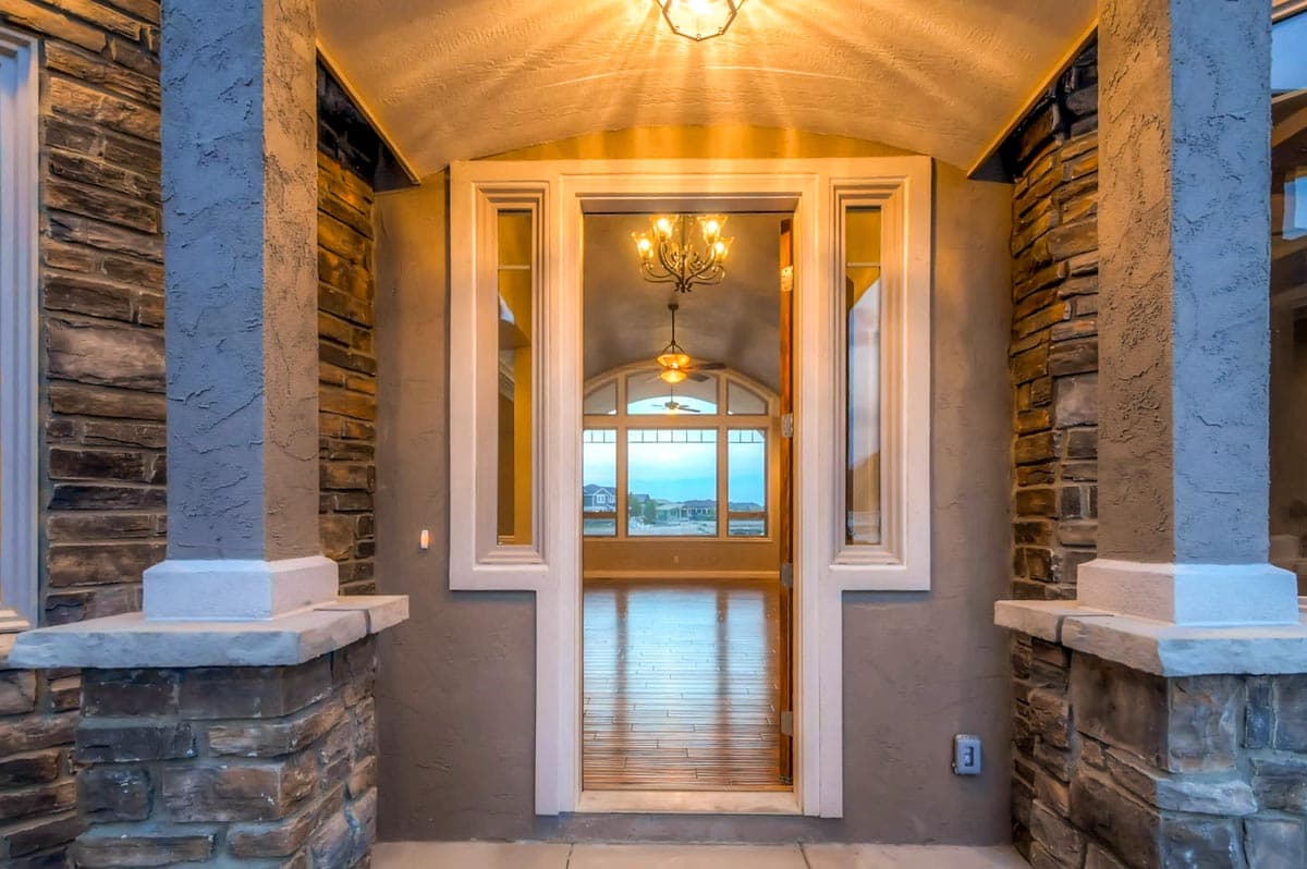 Plan 703010TYL: Transitional House Plan with Finished Lower Level and an Angled 3-Car Garage - Image #4 - European, Transitional