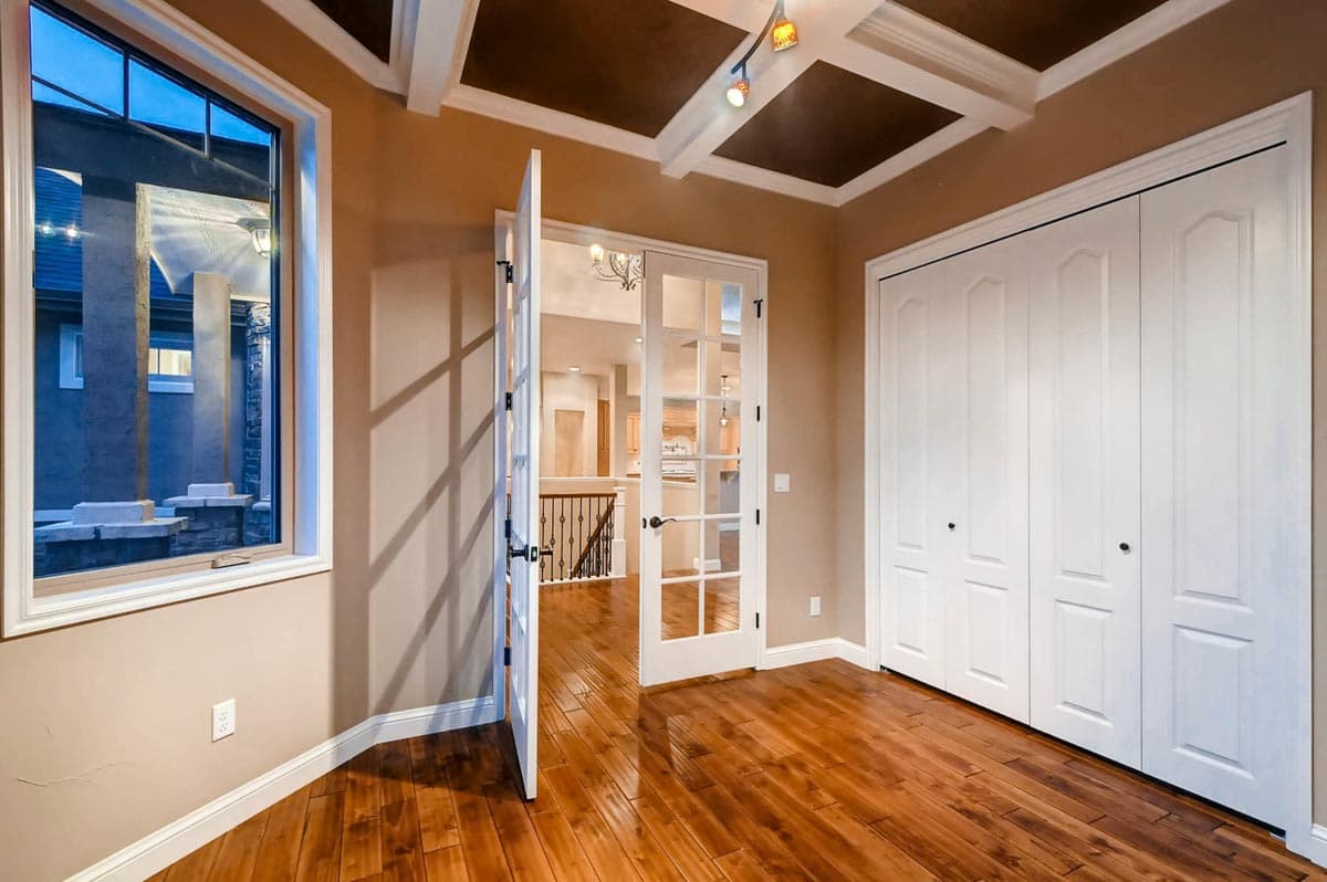 Plan 703010TYL: Transitional House Plan with Finished Lower Level and an Angled 3-Car Garage - Image #5 - European, Transitional