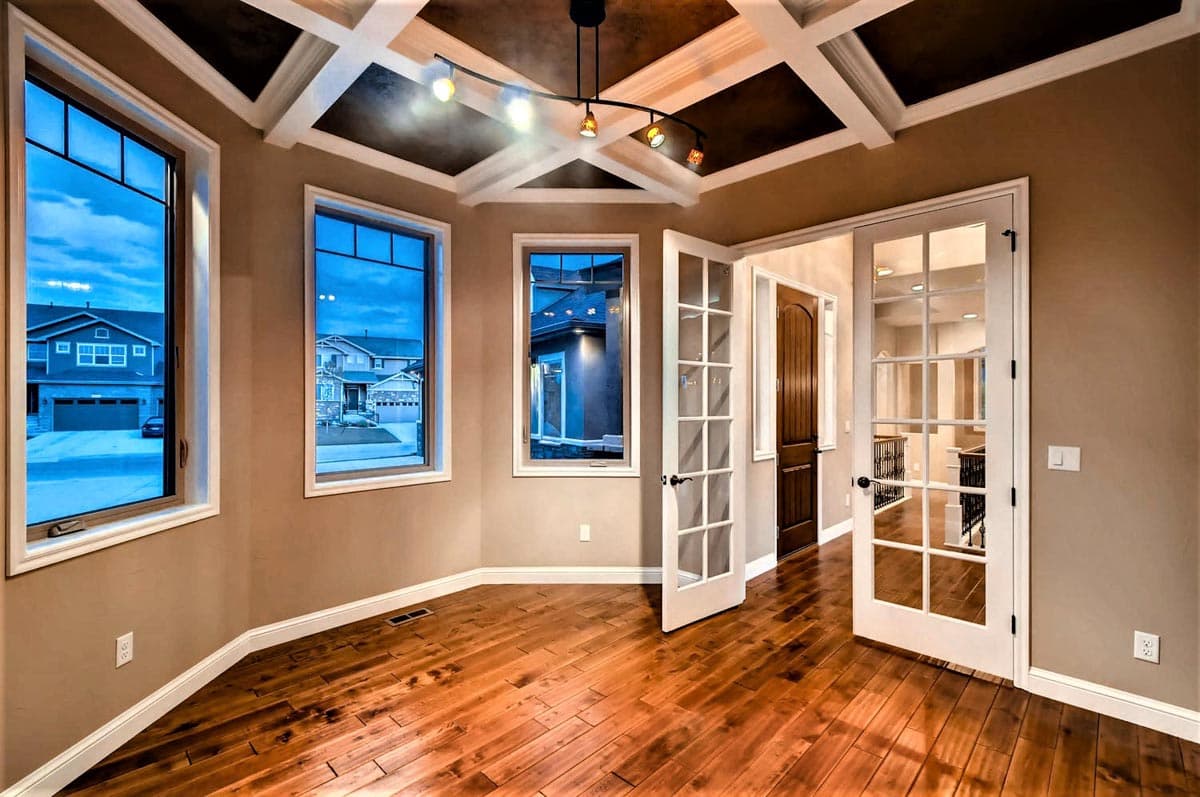 Plan 703010TYL: Transitional House Plan with Finished Lower Level and an Angled 3-Car Garage - Image #6 - European, Transitional