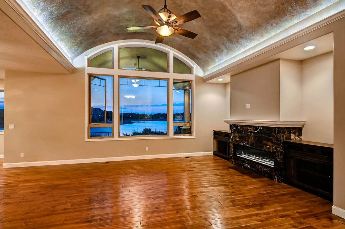 Plan 703010TYL: Transitional House Plan with Finished Lower Level and an Angled 3-Car Garage - Image #9 - European, Transitional