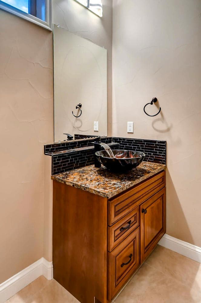 Plan 703010TYL: Transitional House Plan with Finished Lower Level and an Angled 3-Car Garage - Image #19 - European, Transitional