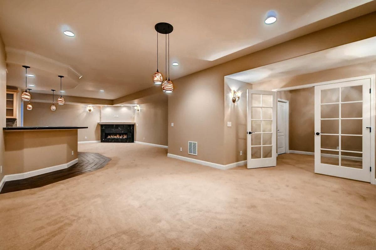 Plan 703010TYL: Transitional House Plan with Finished Lower Level and an Angled 3-Car Garage - Image #27 - European, Transitional