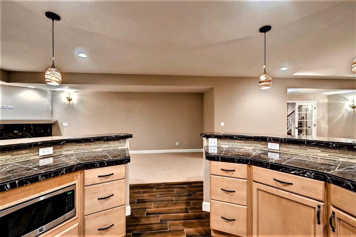 Plan 703010TYL: Transitional House Plan with Finished Lower Level and an Angled 3-Car Garage - Image #32 - European, Transitional