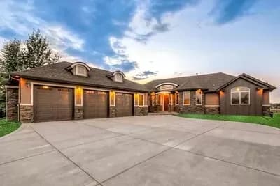 Transitional House Plan with Finished Lower Level and an Angled 3-Car Garage