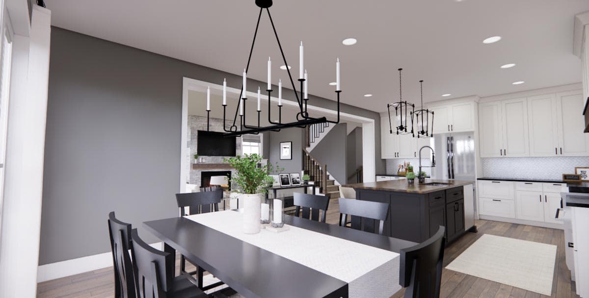 Interior rendering: Open concept dining area with fireplace, staircase, and kitchen with island.