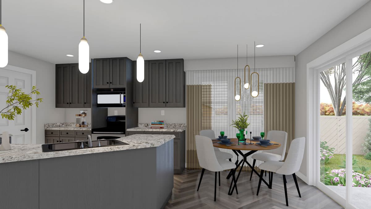 Kitchen and dining area with dark gray cabinets, granite countertops, island, and round dining table with chairs. Sliding glass door to backyard.