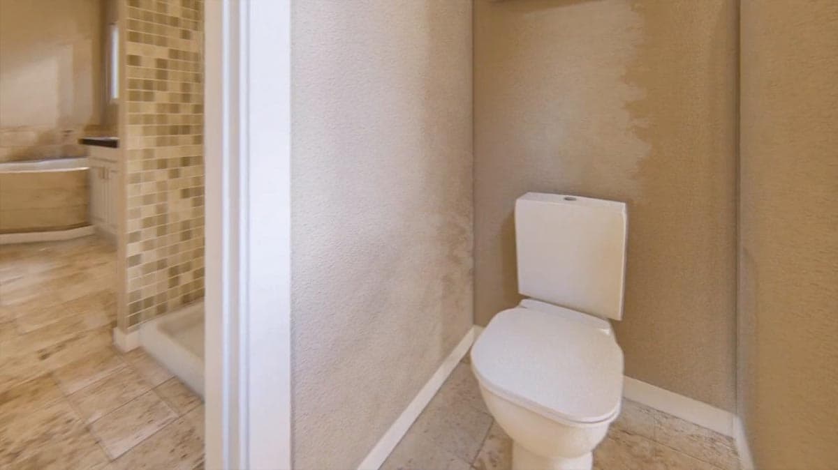 Bathroom interior with toilet, tiled shower stall with glass door, and bathtub with wood-look flooring.