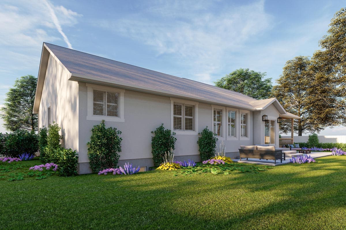 House plan exterior: Single-story residence with a prominent gable roof, multiple double-hung windows, and a covered patio.
