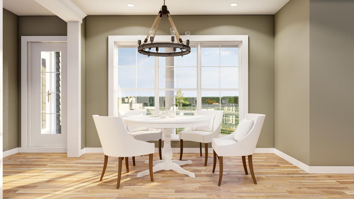 Dining room rendering with round table, four chairs, chandelier, glass door, and large window overlooking yard.