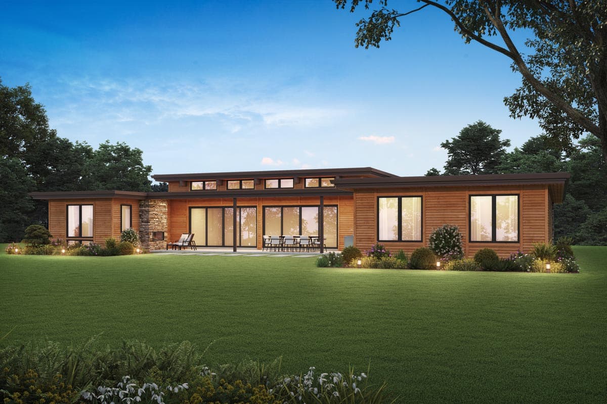 Modern ranch house plan exterior with wood siding, stone chimney, flat roofline, and clerestory windows.