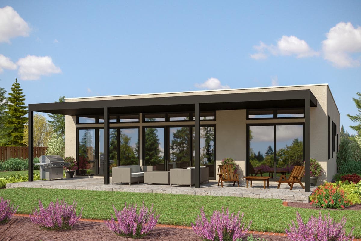 Modern house plan exterior with flat roof, extensive glazing, and covered patio with outdoor furniture and grill.